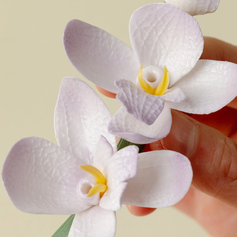 Handcrafted Magnolia incense holder from TRLab Shop, featuring a detailed floral design and a shallow dish for incense sticks.