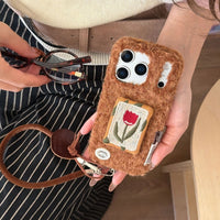 Embroidered tulip design phone case by TRLab Shop with floral embroidery on a protective cover for smartphones.