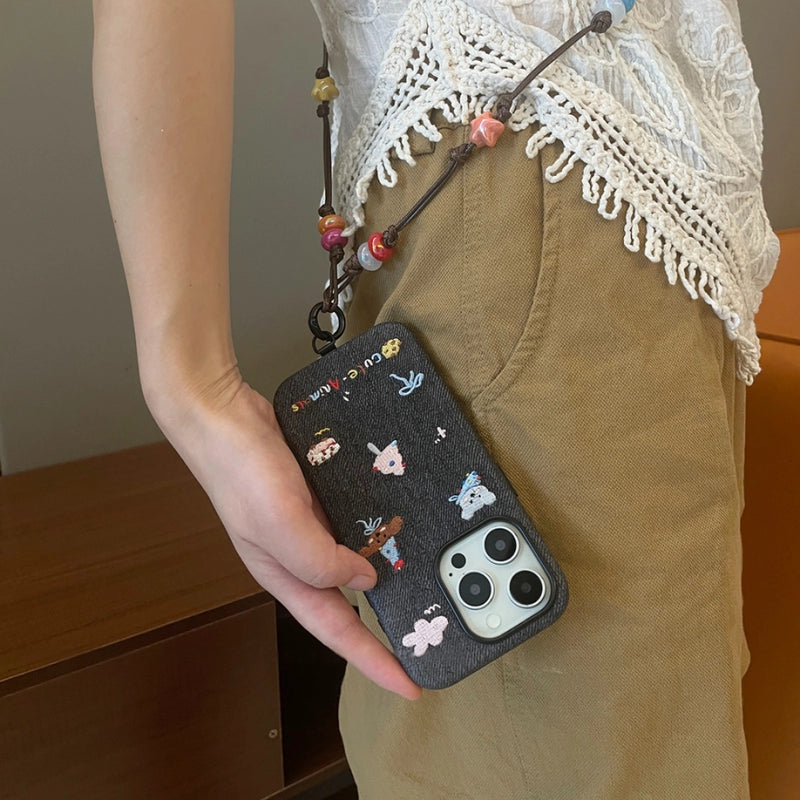 Embroidered animal phone case by TRLab Shop featuring colorful stitched animal design on durable protective cover.
