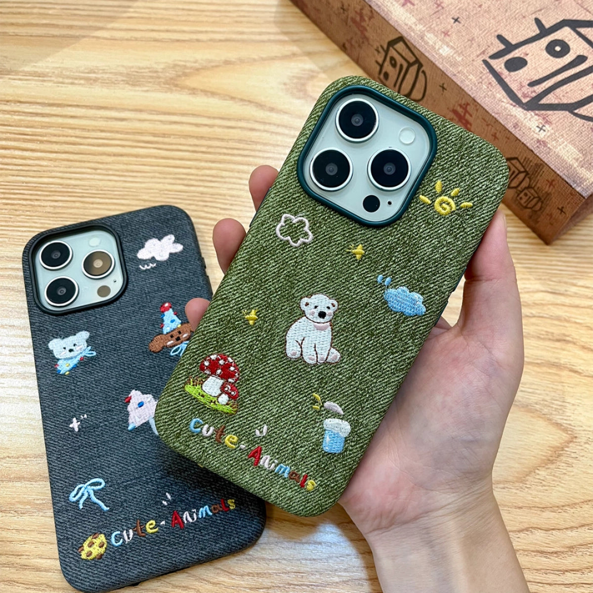 White bear embroidered phone case by TRLab Shop featuring detailed bear illustration on a protective accessory.
