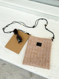 Beaded straw crossbody bag with intricate beadwork and adjustable strap, stylish accessory by TRLab Shop.