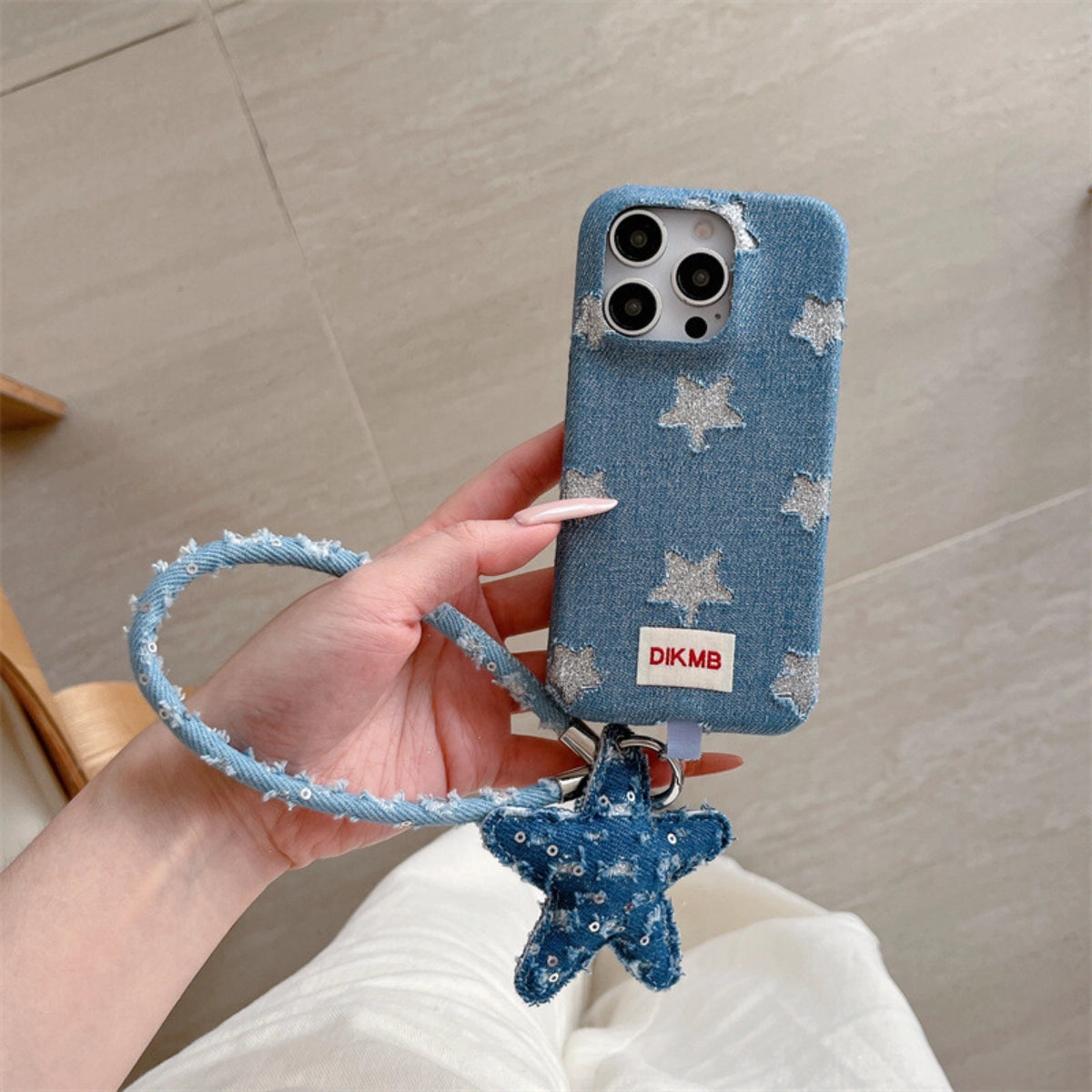 Shimmering Starlight denim phone case by TRLab Shop with glittery, starry design for a stylish protective accessory.