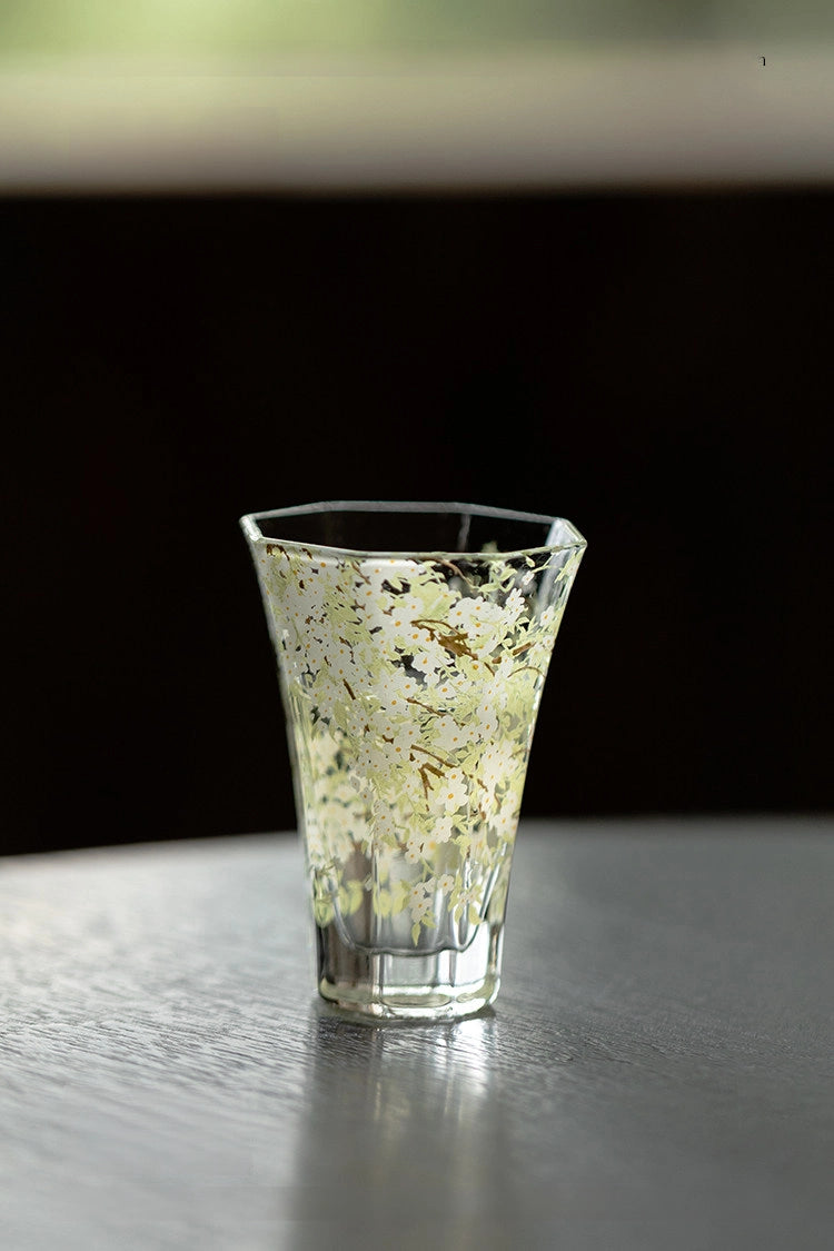 Pear-blossom patterned hexagonal glass tumbler by TRLab Shop, showcasing a clear glass design with elegant pear-blossom motifs.