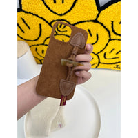 Striped corduroy fabric phone case with toggle button closure, designed by TRLab Shop for a stylish and protective accessory.