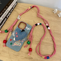Love Heart embroidered phone case with colorful heart designs, made by TRLab Shop, shown on a smartphone in the image.