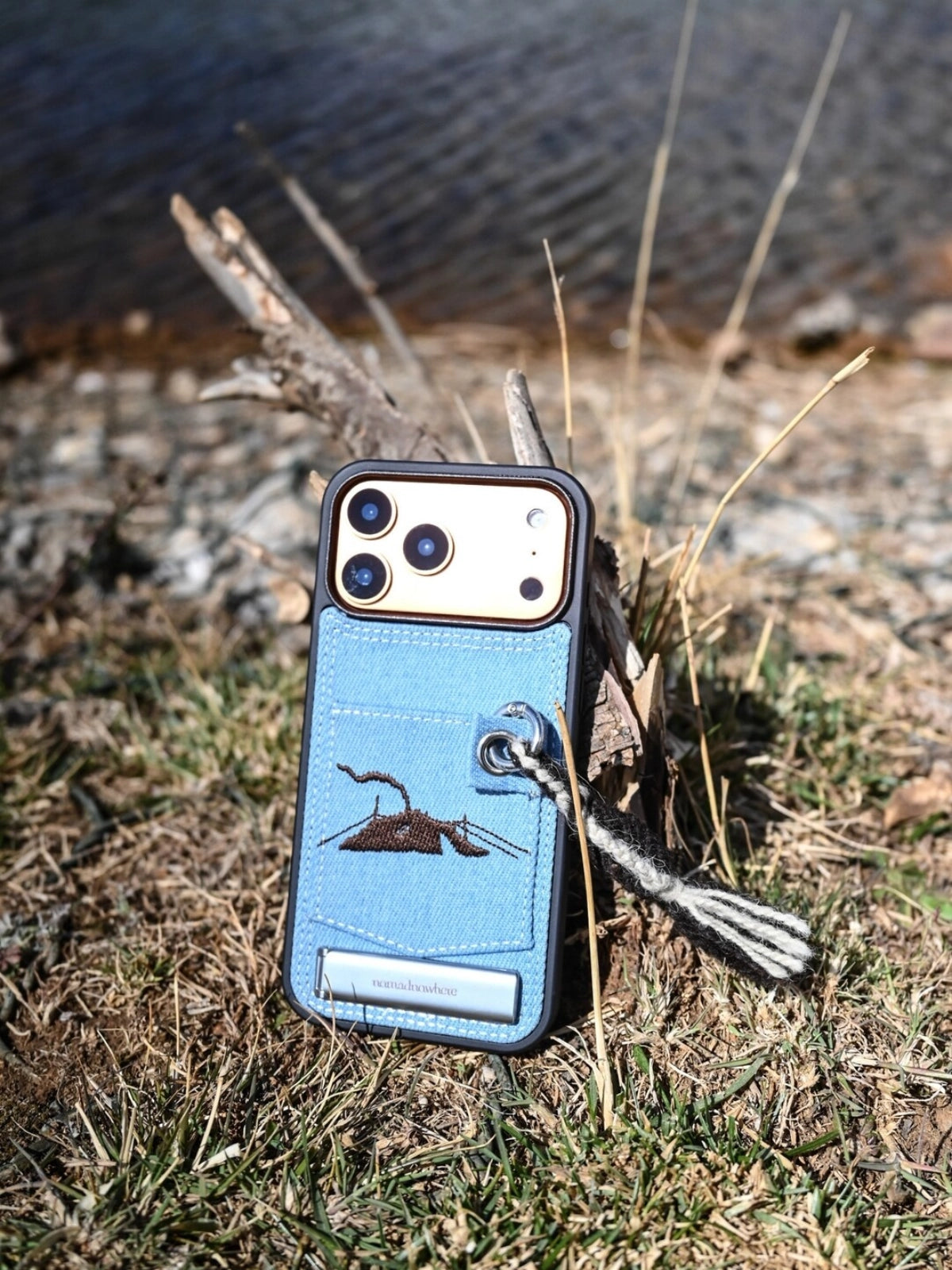 Embroidered tent phone case by TRLab Shop showing colorful embroidered design and protective fabric cover for smartphone.