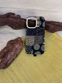 Colorful tie-dyed fabric phone case by TRLab Shop with a vibrant, swirling pattern and soft texture for smartphone protection.