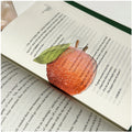 Translucent fruit-shaped acrylic bookmark with colorful fruit illustrations, ideal for marking pages in books.