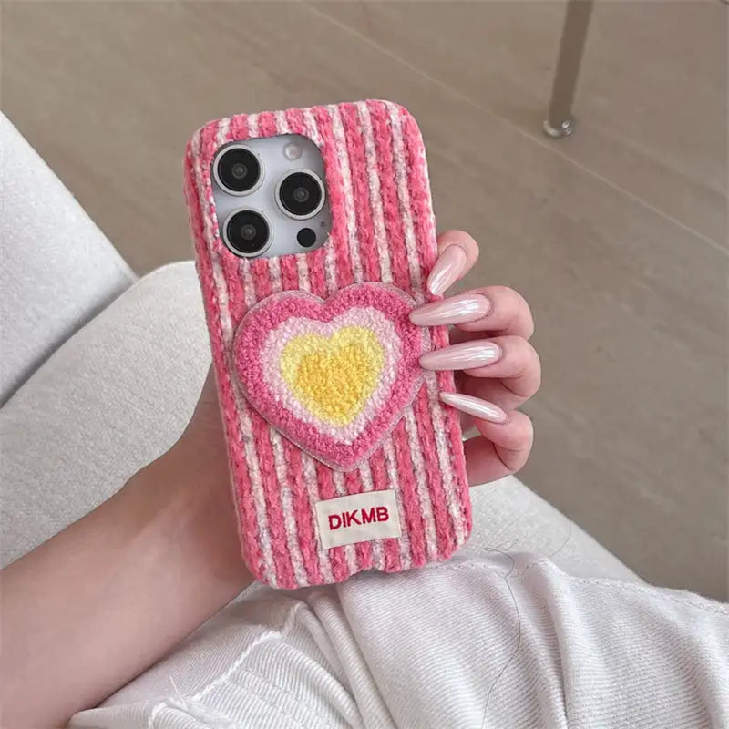 Pink Love Heart embroidered phone case by TRLab Shop with heart-shaped embroidery on a soft pink background.