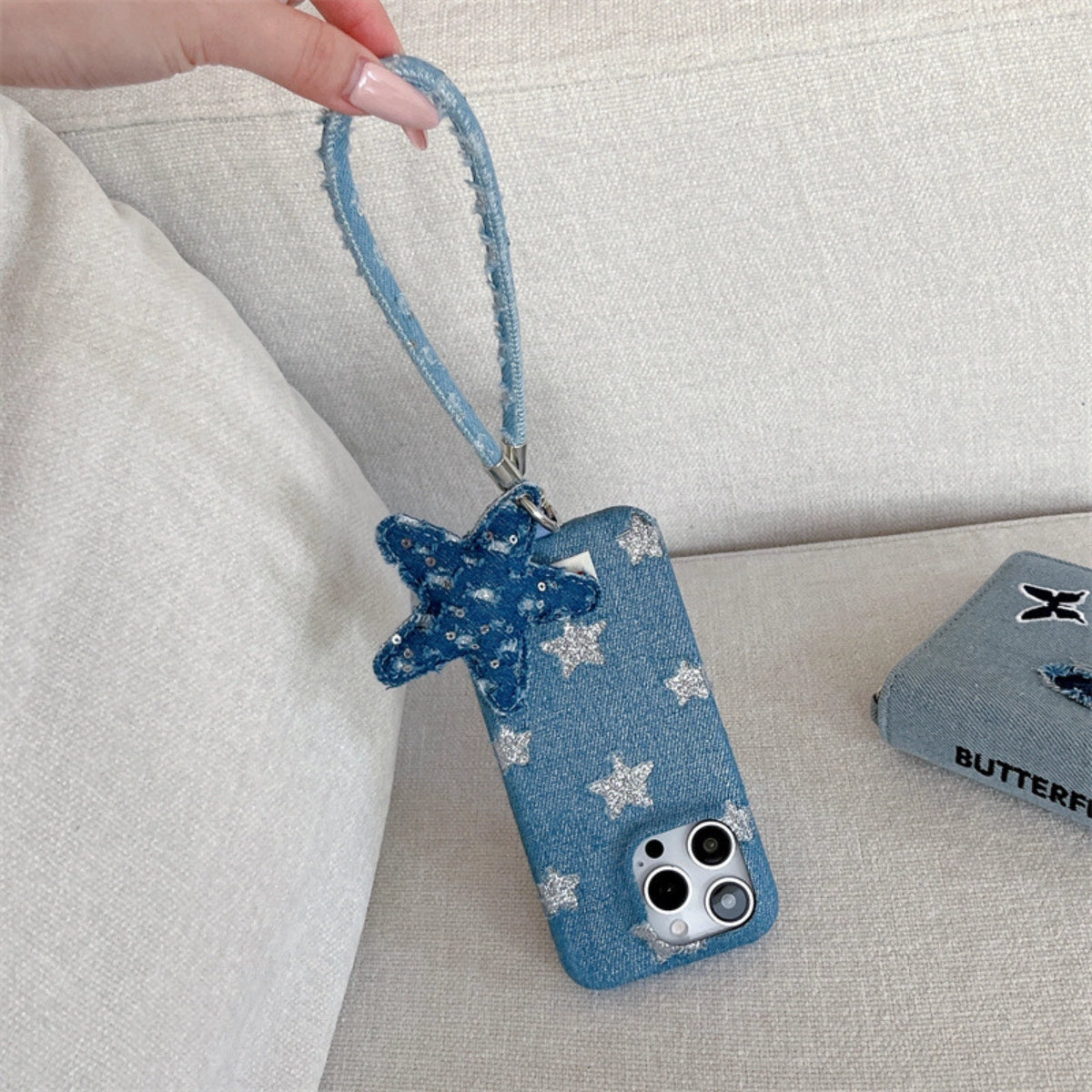 Shimmering Starlight denim phone case by TRLab Shop featuring a sparkling star pattern on durable denim material