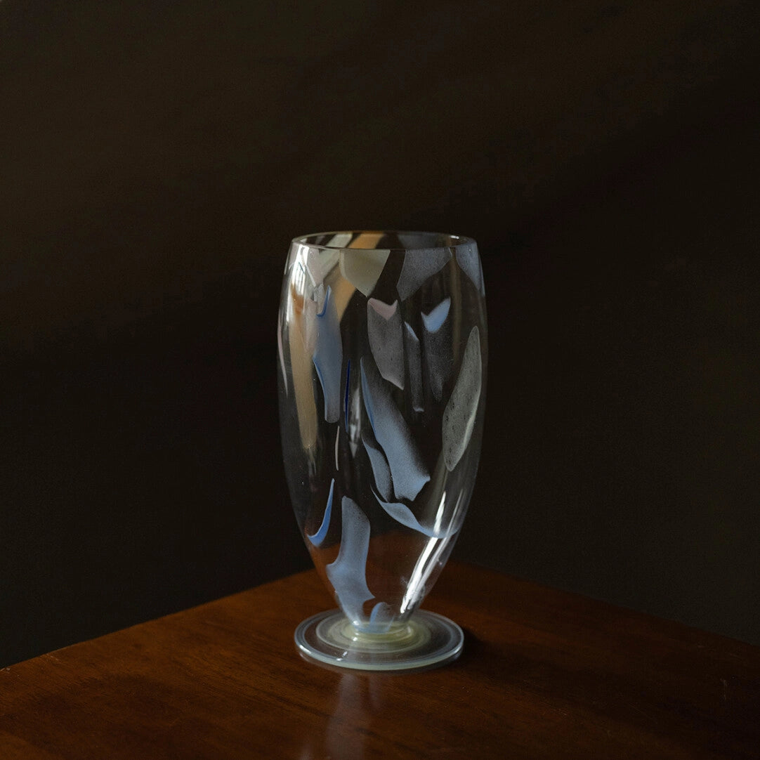 Luminous Fragment Glass Vase by TRLab Shop with textured, glowing glass surface, perfect for decorative floral arrangements.