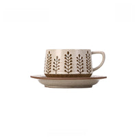 Retro floral ceramic coffee cup and saucer set with colorful floral pattern, by TRLab Shop, perfect for serving coffee.