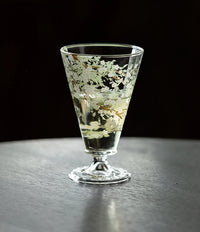 Pear-blossom glass goblet by TRLab Shop featuring a delicate floral design and clear elegant glass for beverage serving.