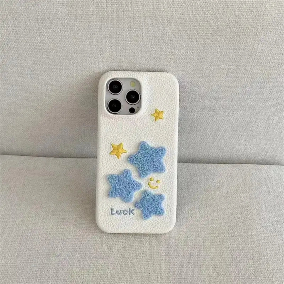 Leather Terry Star embroidered phone case by TRLab Shop, featuring a soft leather material with star embroidery design.
