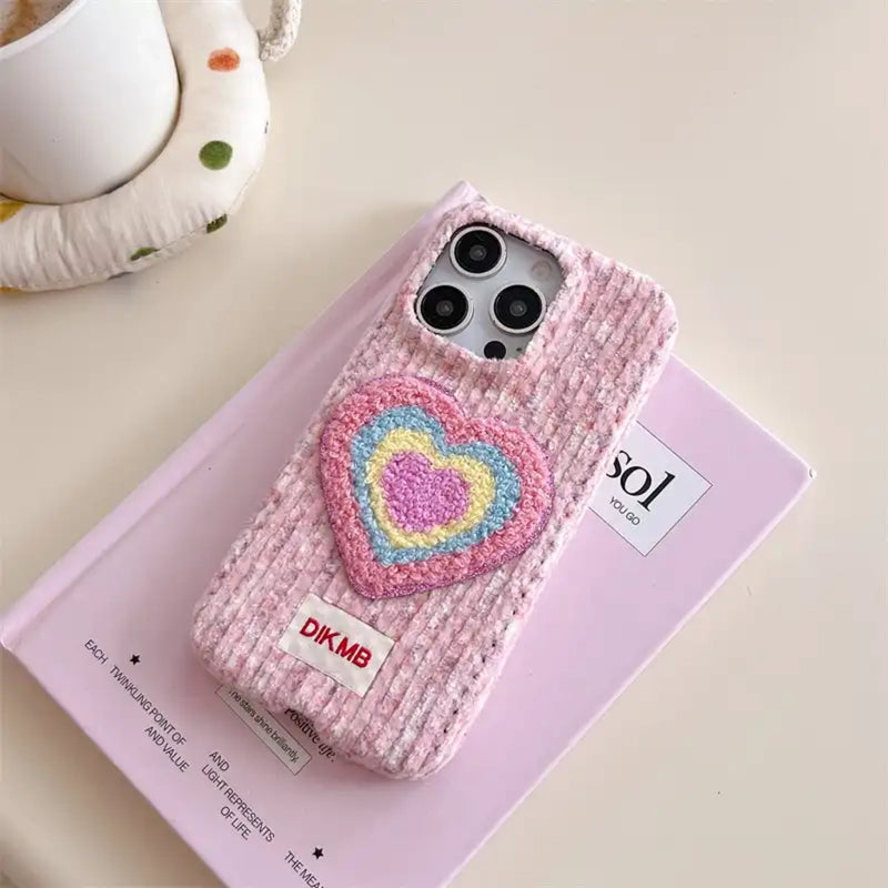 Pink Love Heart embroidered phone case by TRLab Shop featuring a heart design and floral embroidery on a protective cover.