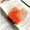 Translucent fruit-shaped acrylic bookmark with colorful fruit illustrations, ideal for marking pages in books.