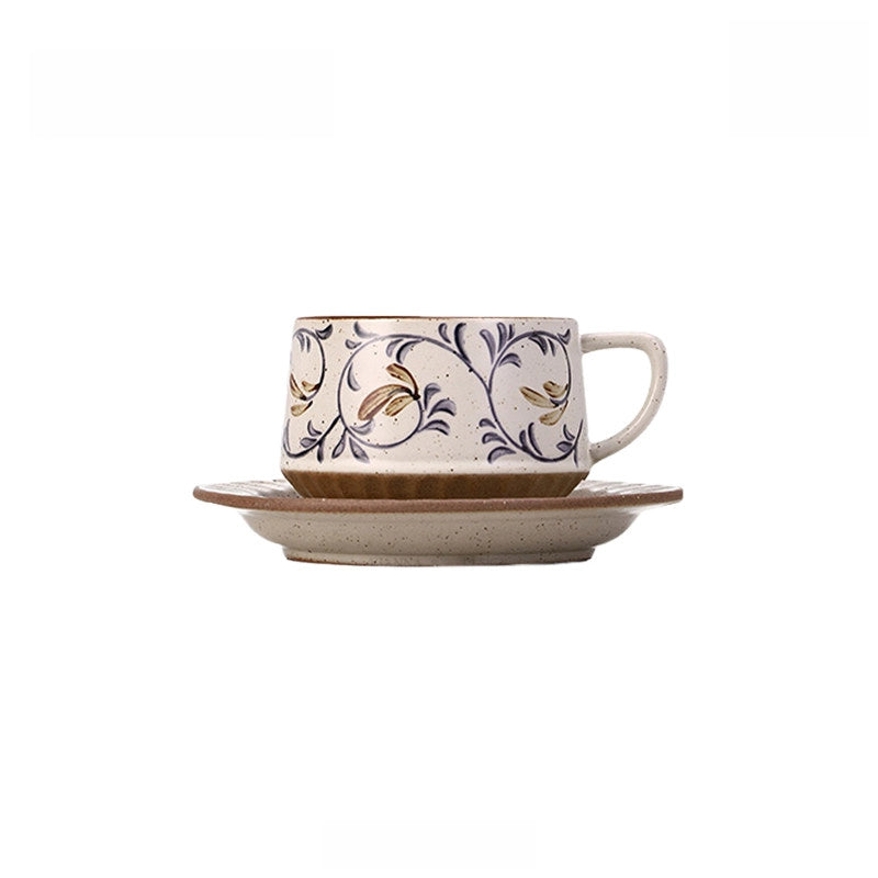 Ceramic coffee cup and saucer set with retro floral pattern, handcrafted by TRLab Shop, featuring vibrant colorful floral design.