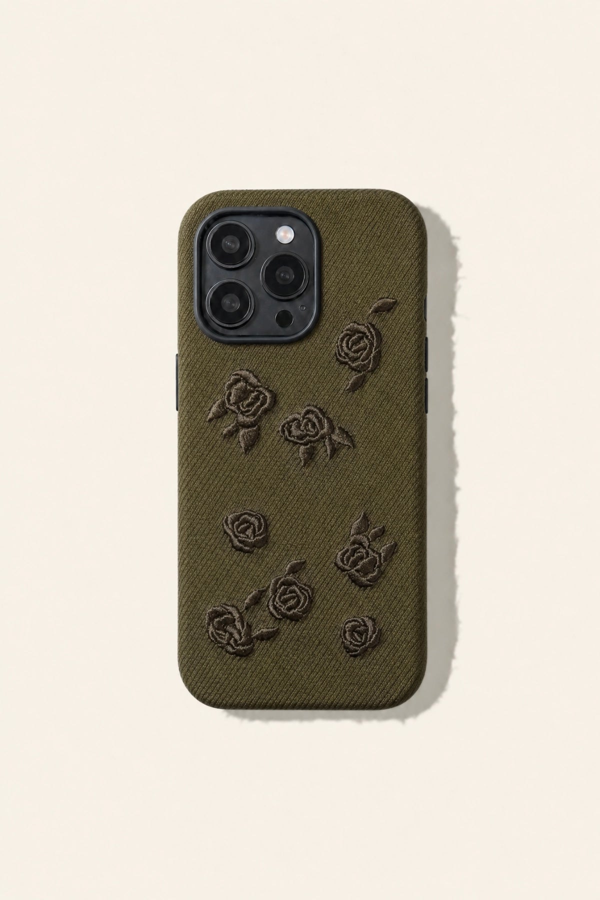 Green rose embroidered phone case by TRLab Shop showing detailed floral embroidery on a sleek protective cover.