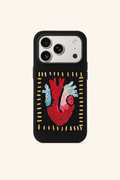 Hand-embroidered heart fabric MagSafe phone case by TRLab Shop, featuring colorful embroidered heart design on soft fabric.