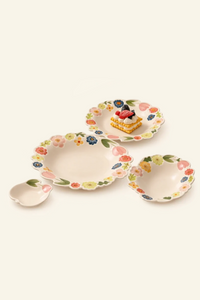 Floral ceramic soup bowl and plate set from TRLab Shop, featuring decorative floral patterns on cream-colored ceramic.