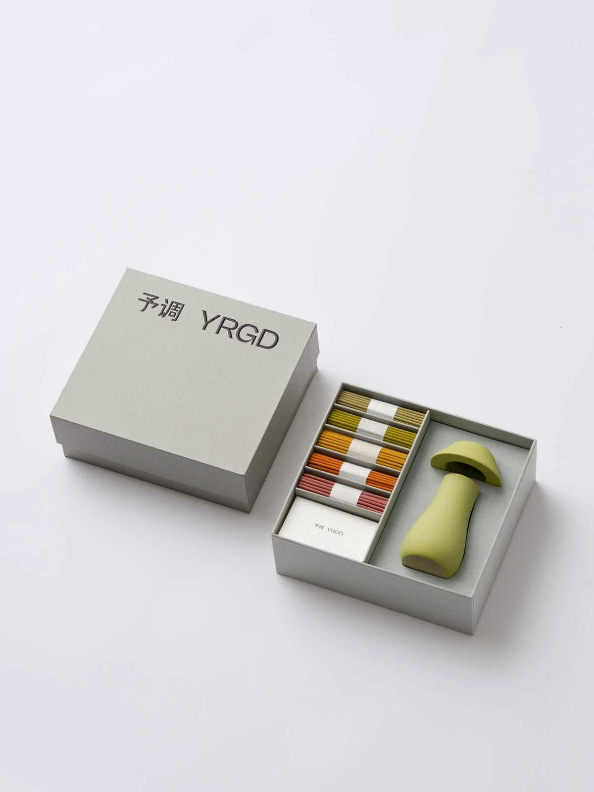 Colorful short incense mushroom gift box by YRGD featuring a green mushroom-shaped incense holder.