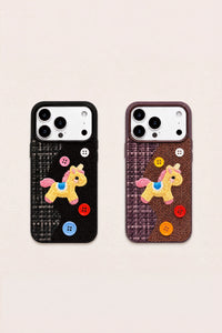 Tweed plaid embroidered unicorn phone case by TRLab Shop, featuring colorful unicorn design on textured fabric background.