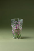 Purple-pink iris glass tumbler by TRLab Shop, showcasing a colorful, decorative drinking glass with intricate iris design.