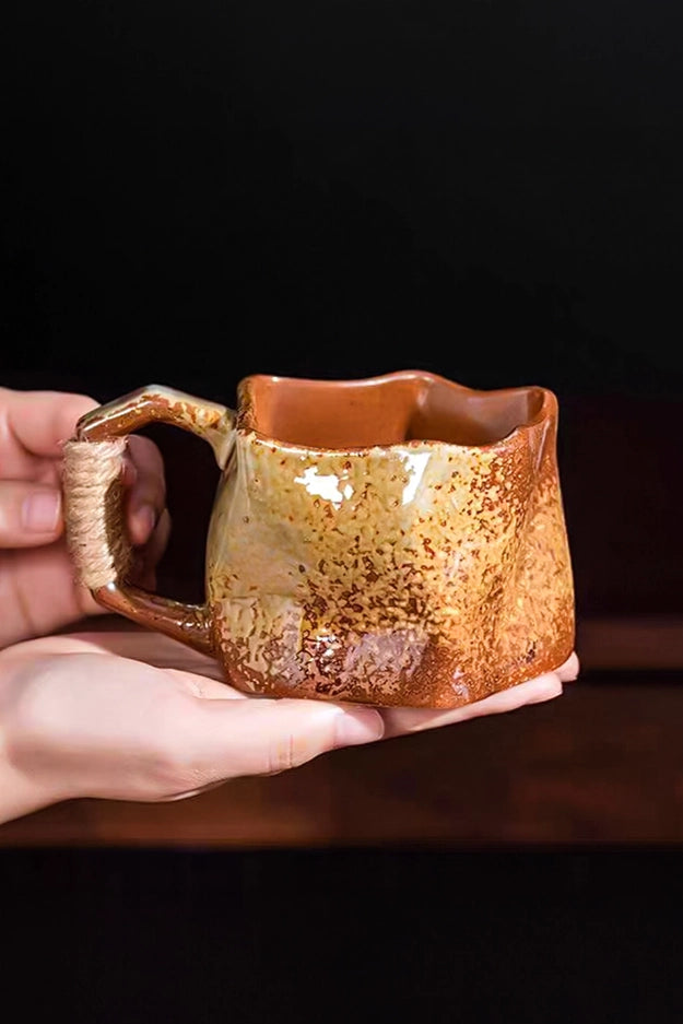 Ceramic mug with rope handle, white finish, designed by TRLab Shop, showcasing a stylish and sturdy coffee or tea cup.