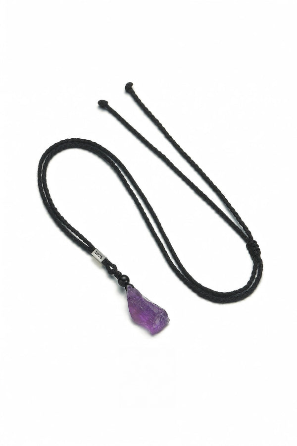 Brazilian Amethyst necklace featuring a polished purple amethyst pendant on a delicate chain, shown against a neutral background.