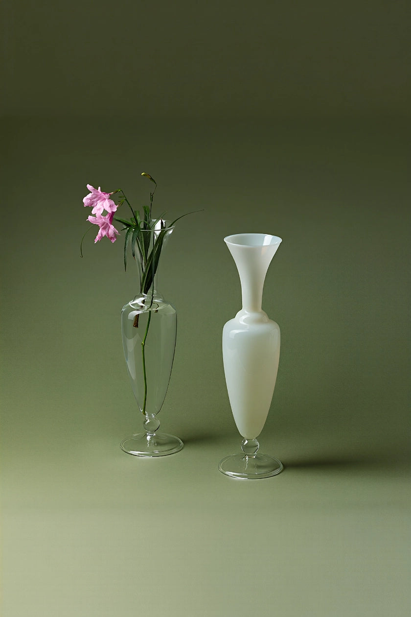 Elegant waisted glass vase by TRLab Shop featuring a clear, curved design ideal for floral arrangements or decorative displays.