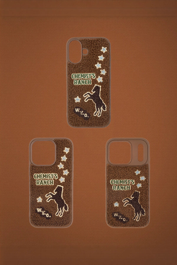 Embroidered ranch stables phone case by TRLab Shop with detailed embroidery design on durable material.