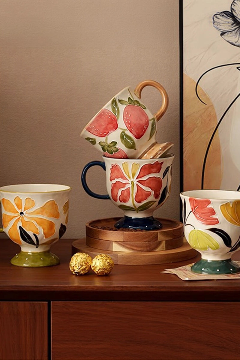 Decorative floral embossed ceramic cup with wildflower design from TRLab Shop, showcasing intricate floral patterns on the surface.