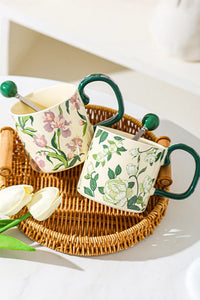 French-style Camellia ceramic mug with floral pattern and elegant handle, perfect for tea or coffee.