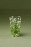Clear glass tumbler featuring fresh daisies design, ideal for drinks, by TRLab Shop.