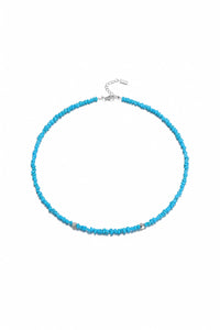 Irregular turquoise beaded necklace with varying size beads, stylish jewelry piece from TRLab Shop.