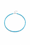 Irregular turquoise beaded necklace with varying size beads, stylish jewelry piece from TRLab Shop.
