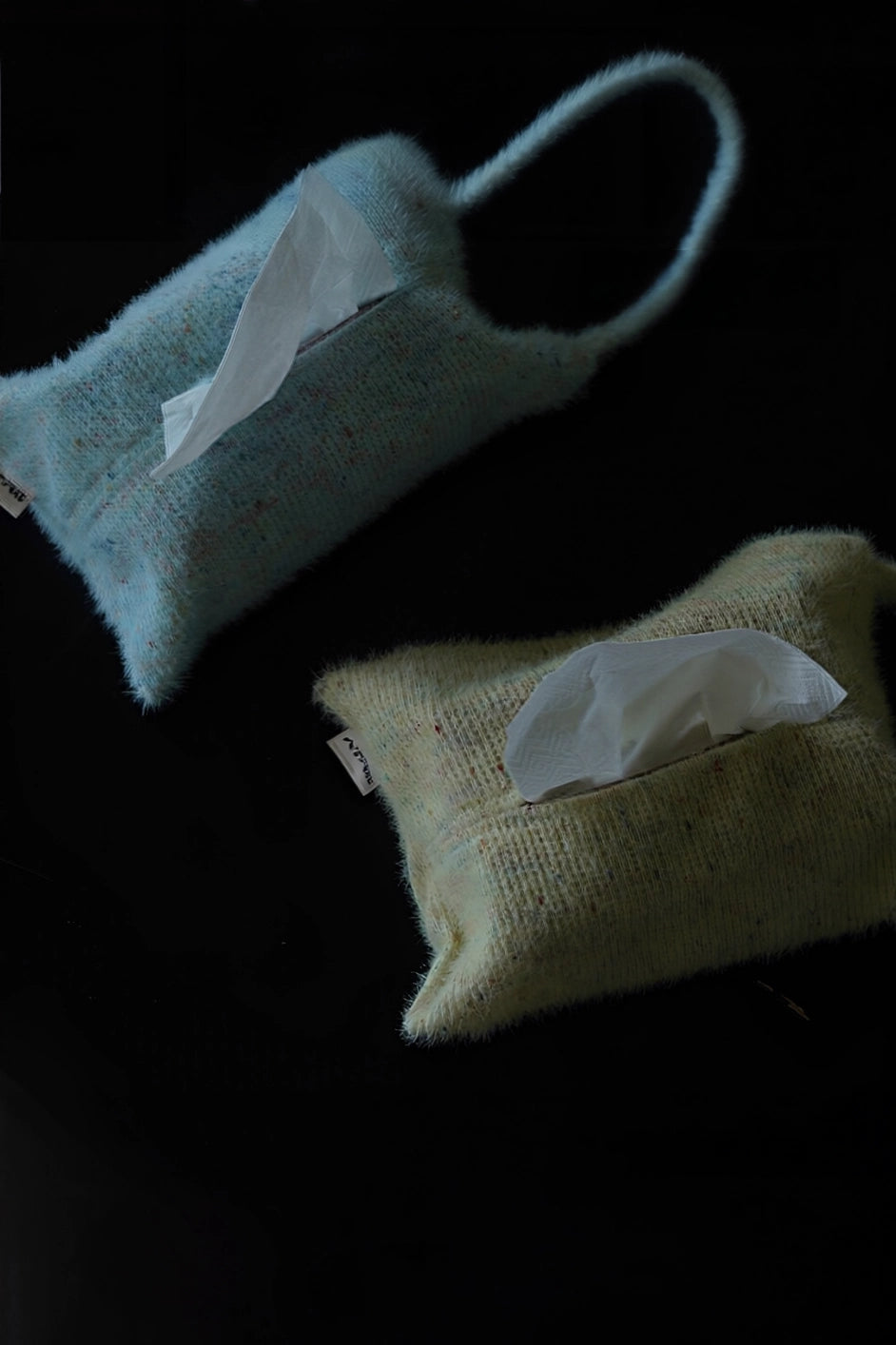 Knitted-handle tissue pack by TRLab Shop with a soft fabric cover and easy-grip handle, designed for portability and style.
