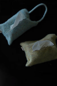 Knitted-handle tissue pack by TRLab Shop with a soft fabric cover and easy-grip handle, designed for portability and style.