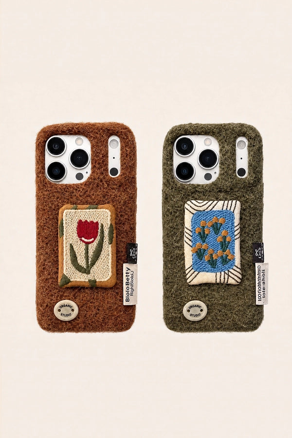 Embroidered tulip design on a TRLab Shop phone case, featuring colorful floral embroidery on a protective accessory.