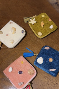 Natural Shell Velour Bag by TRLab Shop with soft velour fabric and shell detail, showcasing its elegant design and textured surface.