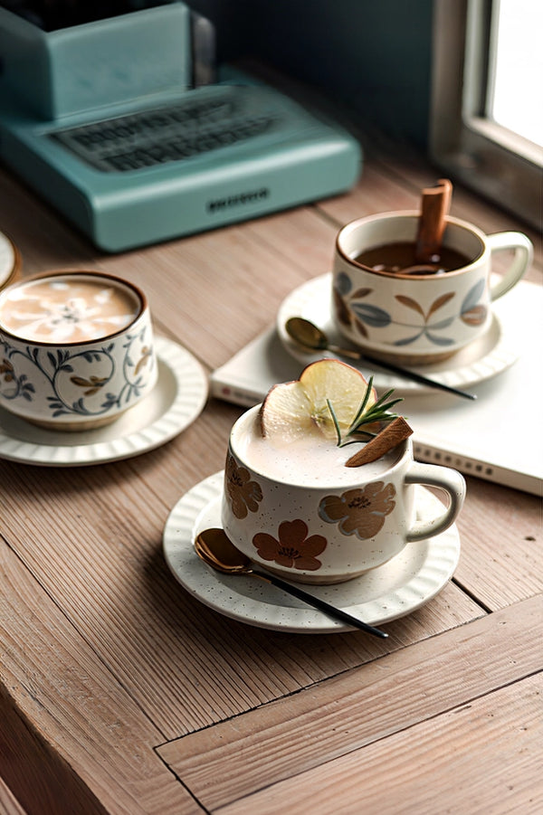 Retro floral ceramic coffee cup and saucer set by TRLab Shop, featuring colorful vintage floral patterns on white ceramic.