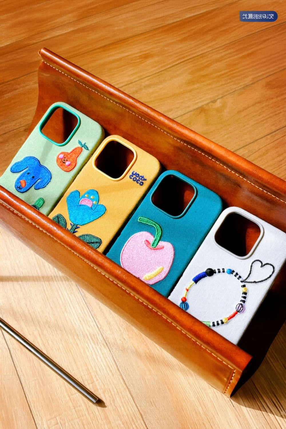 Cute fairy tale embroidered phone case by TRLab Shop featuring colorful fairy tale embroidery on a protective phone cover.
