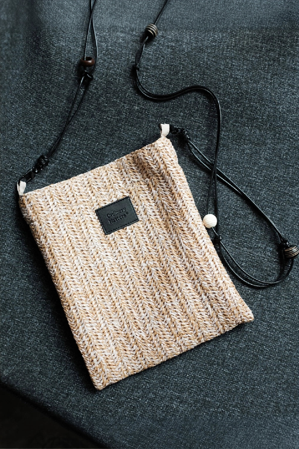 Beaded straw crossbody bag by TRLab Shop featuring colorful bead details and a compact, stylish design.
