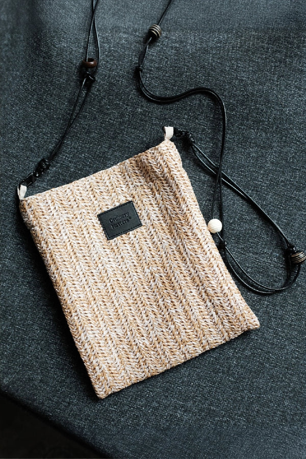 Beaded straw crossbody bag by TRLab Shop featuring colorful bead details and a compact, stylish design.