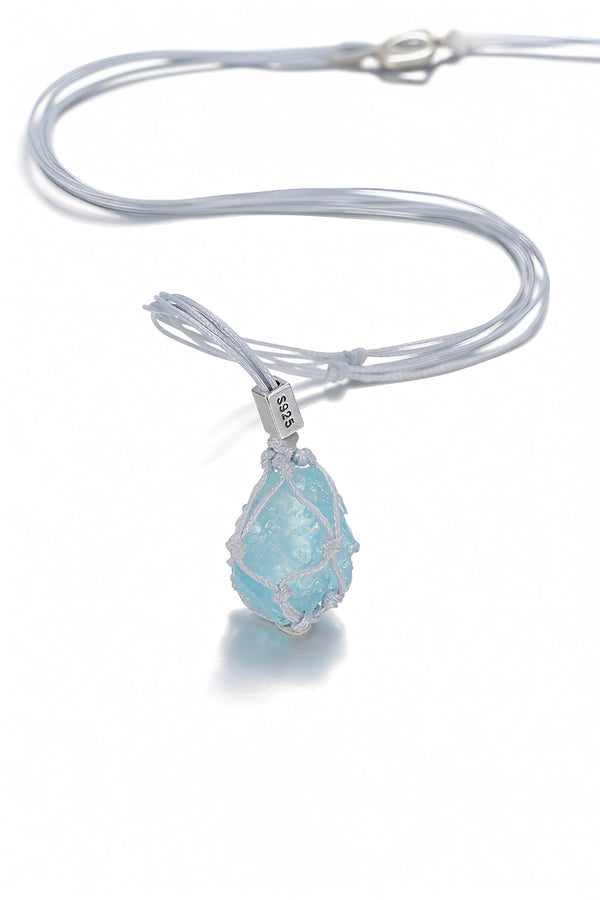 Aquamarine hand-woven cord necklace by TRLab Shop featuring a delicate aquamarine pendant on natural woven cord.
