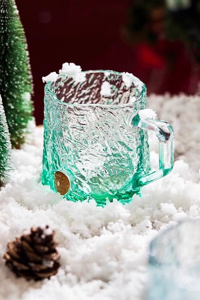 Glacier-textured gradient glass mug by TRLab Shop featuring a frosted, icy blue design and smooth curved handle.