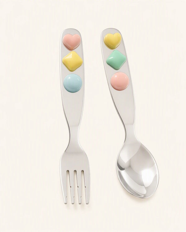 Jelly Jade stainless steel spoon and fork set for dinnerware, featuring smooth, shiny handles and polished metal surfaces.