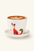 Red ceramic tumbler with a red fox design from TRLab Shop, showing a sleek, glossy finish and detailed fox illustration.
