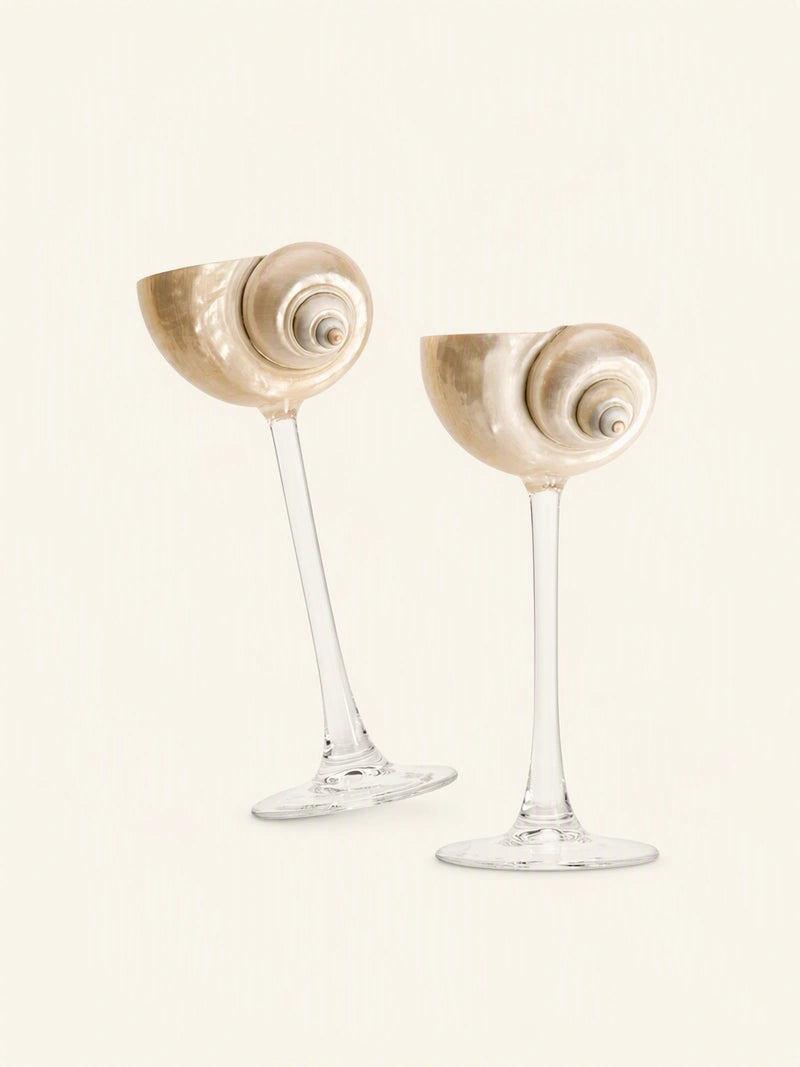 Silver and green conch-shaped wine glass, elegant drinkware by TRLab Shop with intricate conch shell design.