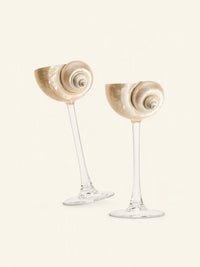 Silver and green conch-shaped wine glass, elegant drinkware by TRLab Shop with intricate conch shell design.